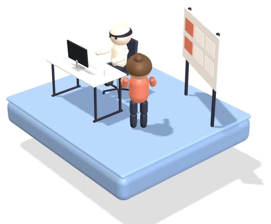 A trainer standing by a learner at a desk, with a board behind